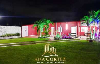 Imagem: A casa possui 4 Dormitórios, 2 Banheiros, 5 Vagas na garagem