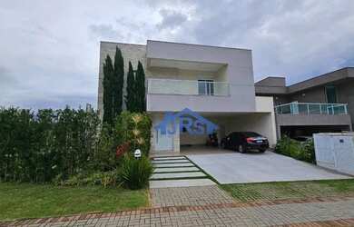 Imagem: A casa em condomínio para alugar possui 5 Dormitórios, 3 Banheiros