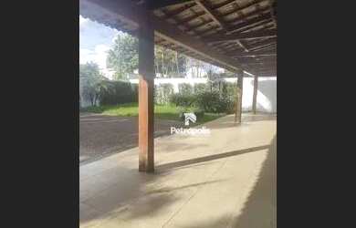 Imagem: A casa possui 3 Dormitórios, 4 Banheiros, 5 Vagas na garagem