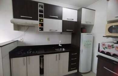 Imagem: O apartamento possui 2 Dormitórios, 1 Banheiro, 1 Vaga na garagem