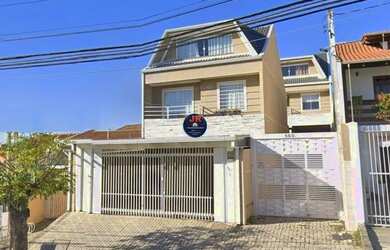 Imagem: A casa possui 3 Dormitórios, 3 Banheiros, 3 Vagas na garagem