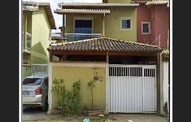 Imagem: A casa possui 2 Dormitórios, 3 Banheiros, 1 Vaga na garagem