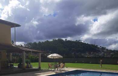 Imagem: A casa possui 5 Dormitórios, 5 Banheiros, 5 Vagas na garagem