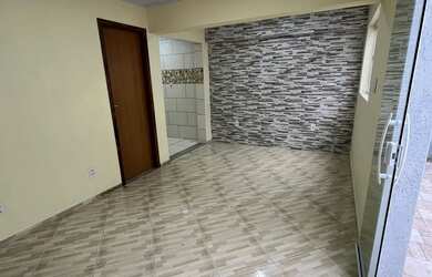 Imagem: A casa possui 2 Dormitórios, 2 Banheiros e está localizado