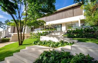 Imagem: A casa possui 5 Dormitórios, 5 Banheiros, 5 Vagas na garagem