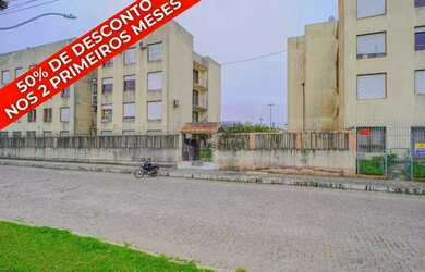 Imagem: O apartamento possui 3 Dormitórios, 1 Banheiro, 1 Vaga na garagem