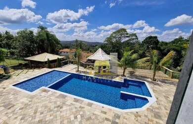 Imagem: A casa em condomínio possui 5 Dormitórios, 5 Banheiros, 5