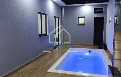 Imagem: A casa possui 3 Dormitórios, 2 Banheiros, 4 Vagas na garagem