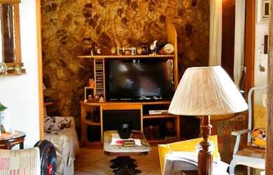 Imagem: A casa possui 4 Dormitórios, 5 Banheiros e 203m² de Área