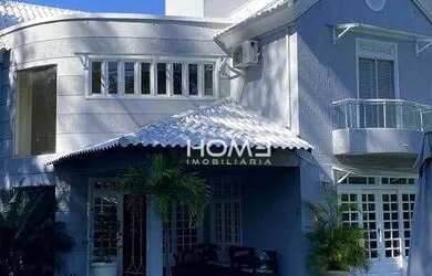 Imagem: A casa em condomínio possui 5 Dormitórios, 3 Banheiros, 4