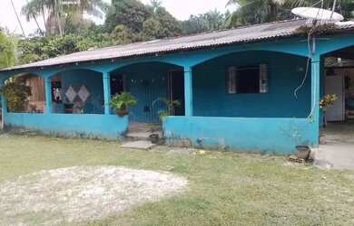 Imagem: A casa possui 3 Dormitórios, 2 Banheiros, 2 Vagas na garagem