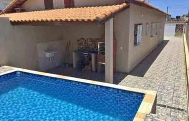 Imagem: A casa possui 2 Dormitórios, 2 Banheiros, 2 Vagas na garagem