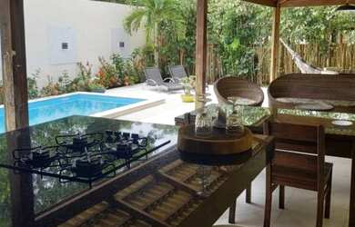 Imagem: A casa possui 3 Dormitórios, 4 Vagas na garagem e está localizado