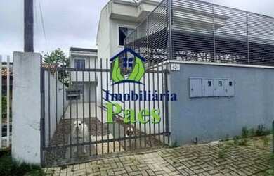 Imagem: A casa possui 3 Dormitórios, 2 Banheiros, 4 Vagas na garagem