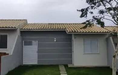 Imagem: A casa em condomínio possui 2 Dormitórios, 1 Banheiro, 2 Vagas