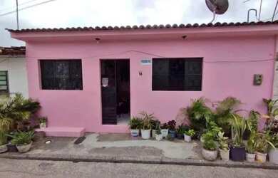 Imagem: A casa possui 2 Dormitórios, 1 Banheiro, 1 Vaga na garagem