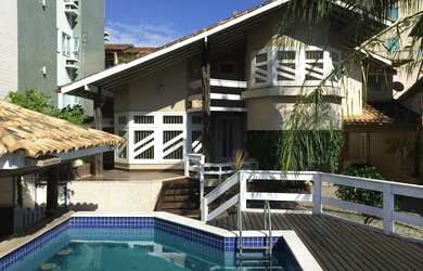 Imagem: A casa possui 5 Dormitórios, 4 Banheiros, 3 Vagas na garagem