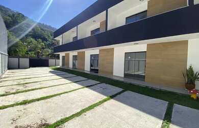 Imagem: A casa possui 2 Dormitórios, 1 Banheiro, 1 Vaga na garagem