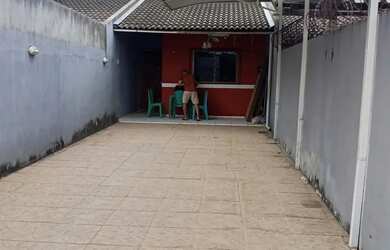 Imagem: A casa possui 2 Dormitórios, 2 Banheiros, 3 Vagas na garagem