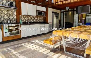 Imagem: O apartamento possui 4 Dormitórios, 2 Banheiros, 2 Vagas na