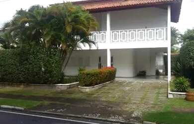 Imagem: A casa possui 5 Dormitórios, 5 Banheiros, 4 Vagas na garagem