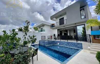 Imagem: A casa em condomínio possui 4 Dormitórios, 5 Banheiros, 4