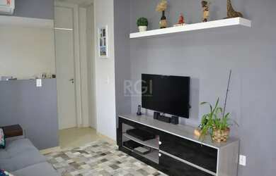 Imagem: O apartamento possui 2 Dormitórios, 1 Banheiro, 1 Vaga na garagem