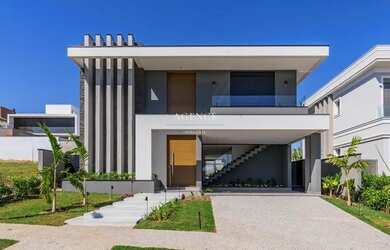 Imagem: A casa em condomínio possui 4 Dormitórios, 5 Banheiros, 4