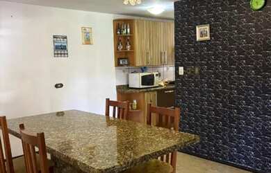 Imagem: A casa possui 2 Dormitórios, 2 Banheiros, 3 Vagas na garagem