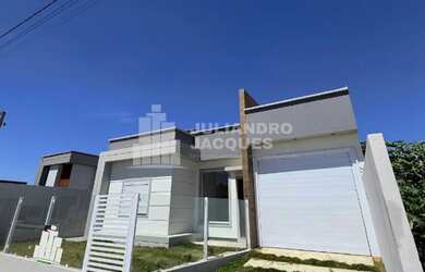 Imagem: A casa possui 2 Dormitórios, 1 Banheiro, 1 Vaga na garagem