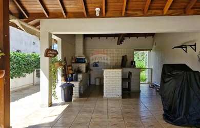 Imagem: A casa em condomínio possui 5 Dormitórios, 5 Banheiros, 4