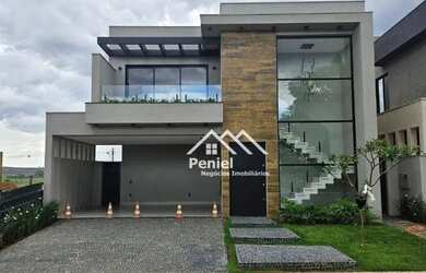 Imagem: A casa em condomínio possui 4 Dormitórios, 5 Banheiros, 3