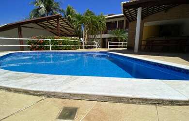 Imagem: A casa possui 5 Dormitórios, 5 Banheiros, 4 Vagas na garagem