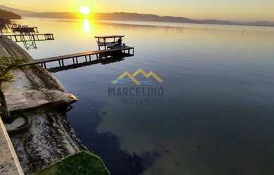 Imagem: A casa possui 5 Dormitórios, 5 Banheiros, 5 Vagas na garagem