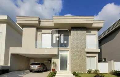 Imagem: A casa em condomínio possui 4 Dormitórios, 5 Banheiros, 2