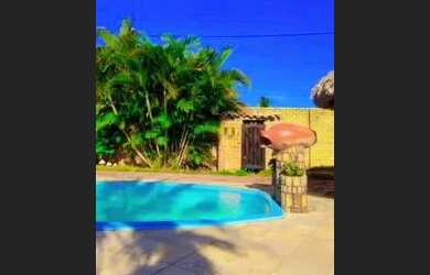 Imagem: A casa possui 5 Dormitórios, 5 Banheiros, 5 Vagas na garagem