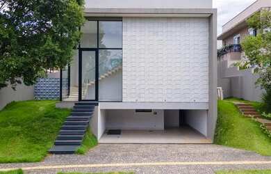 Imagem: A casa possui 5 Dormitórios, 5 Banheiros, 5 Vagas na garagem