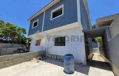 Imagem: A casa possui 2 Dormitórios, 1 Banheiro, 2 Vagas na garagem