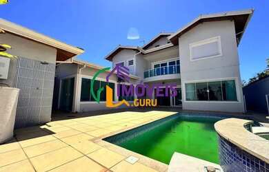 Imagem: A casa possui 3 Dormitórios, 4 Banheiros, 3 Vagas na garagem