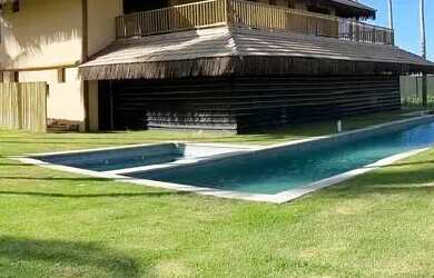 Imagem: A casa possui 5 Dormitórios, 5 Banheiros, 5 Vagas na garagem