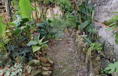 Imagem: A casa possui 4 Dormitórios, 5 Banheiros, 2 Vagas na garagem