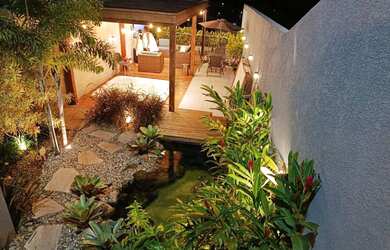 Imagem: A casa possui 3 Dormitórios, 4 Banheiros, 4 Vagas na garagem