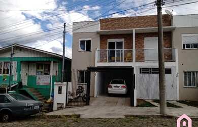 Imagem: A casa possui 3 Dormitórios, 1 Banheiro, 1 Vaga na garagem