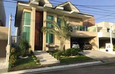 Imagem: A casa em condomínio possui 5 Dormitórios, 5 Banheiros, 4