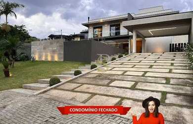 Imagem: A casa em condomínio possui 4 Dormitórios, 5 Banheiros, 5