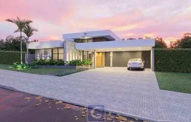 Imagem: A casa possui 4 Dormitórios, 5 Banheiros, 5 Vagas na garagem