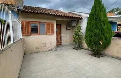 Imagem: A casa possui 2 Dormitórios, 1 Banheiro, 1 Vaga na garagem