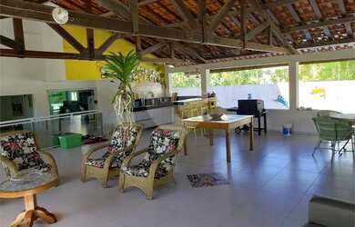 Imagem: A casa possui 5 Dormitórios, 5 Banheiros, 5 Vagas na garagem