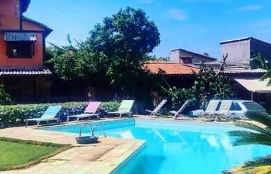 Imagem: A casa possui 5 Dormitórios, 5 Banheiros, 5 Vagas na garagem