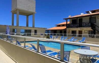 Imagem: A casa possui 2 Dormitórios e 1 Vaga na garagem e está localizado